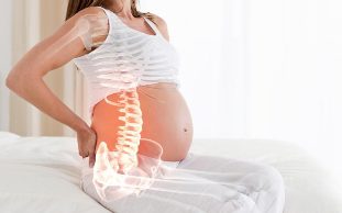 el dolor de espalda durante el embarazo causa