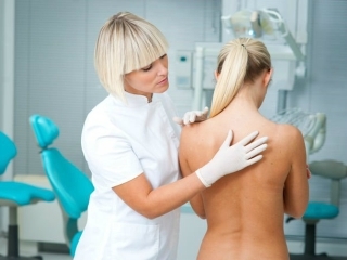el dolor de espalda en el centro del diagnóstico